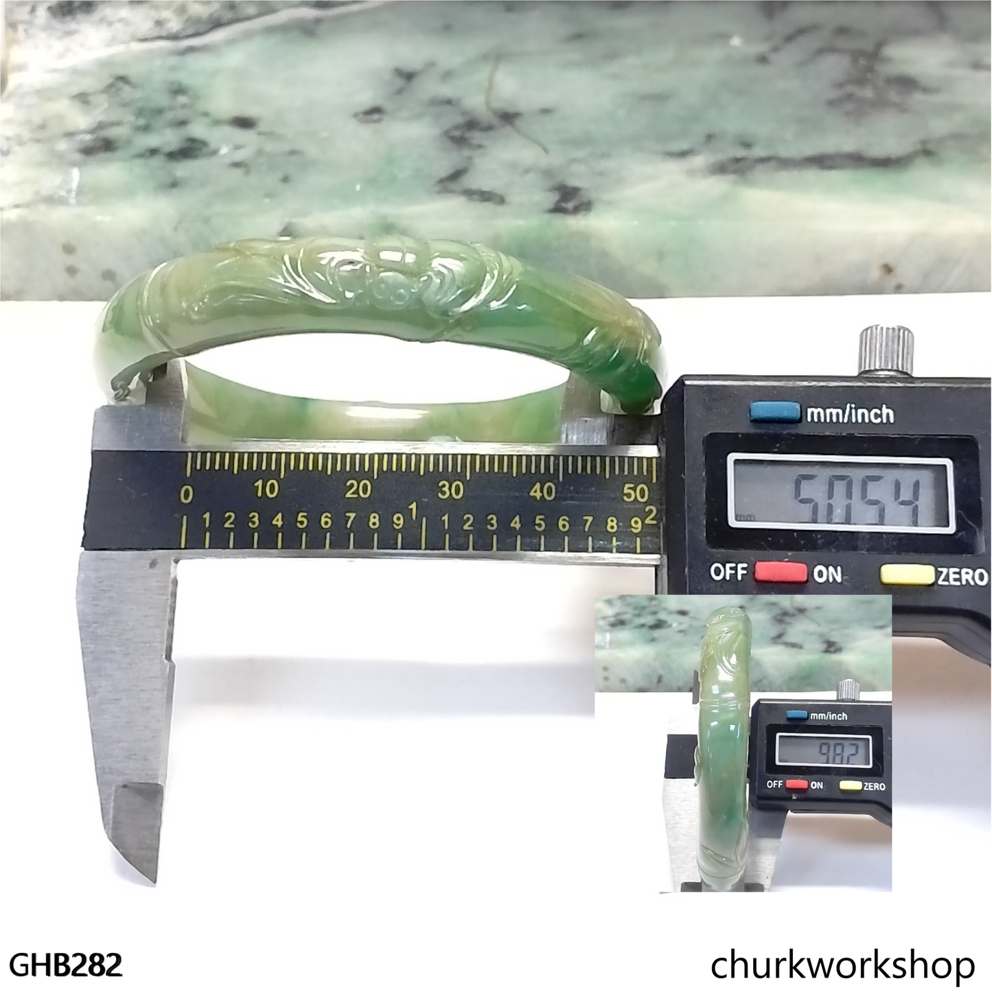 Small carved green jade bangle