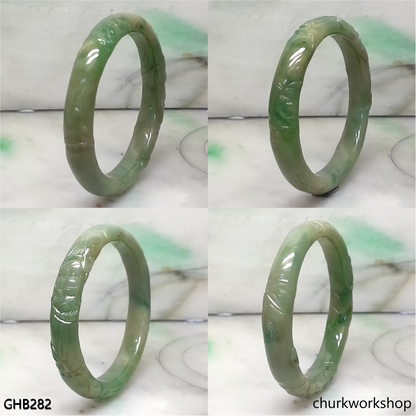 Small carved green jade bangle