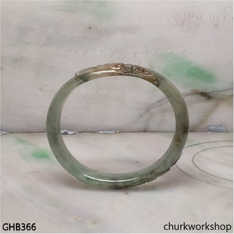 Small carved oval jade bangle