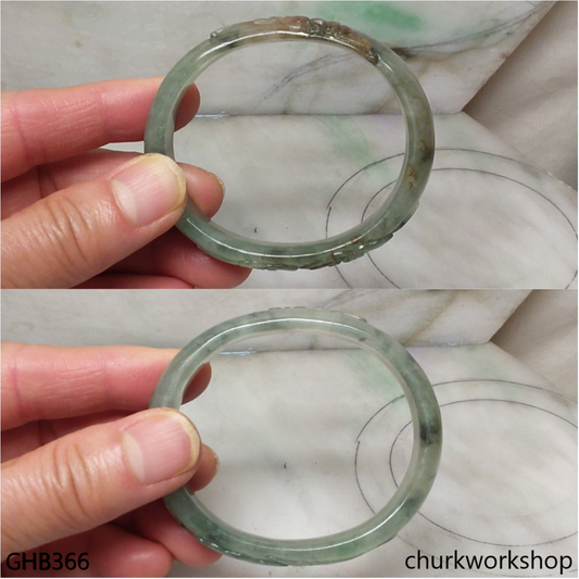 Small carved oval jade bangle