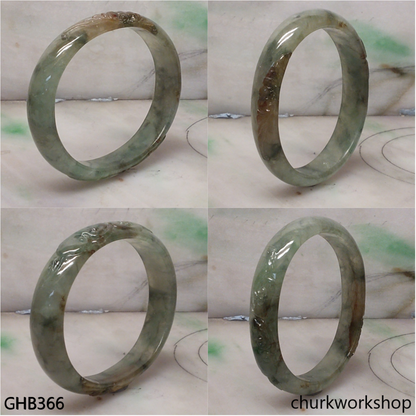 Small carved oval jade bangle