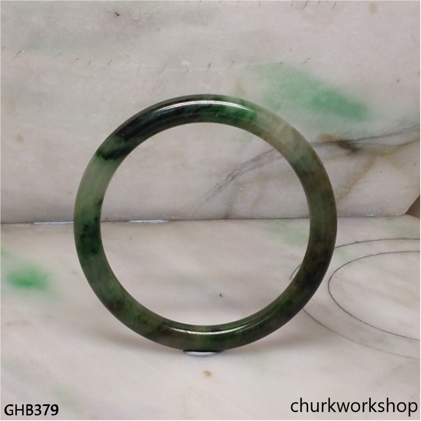 Small dark green jade bangle