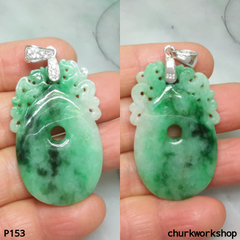 Carved jade pendant.