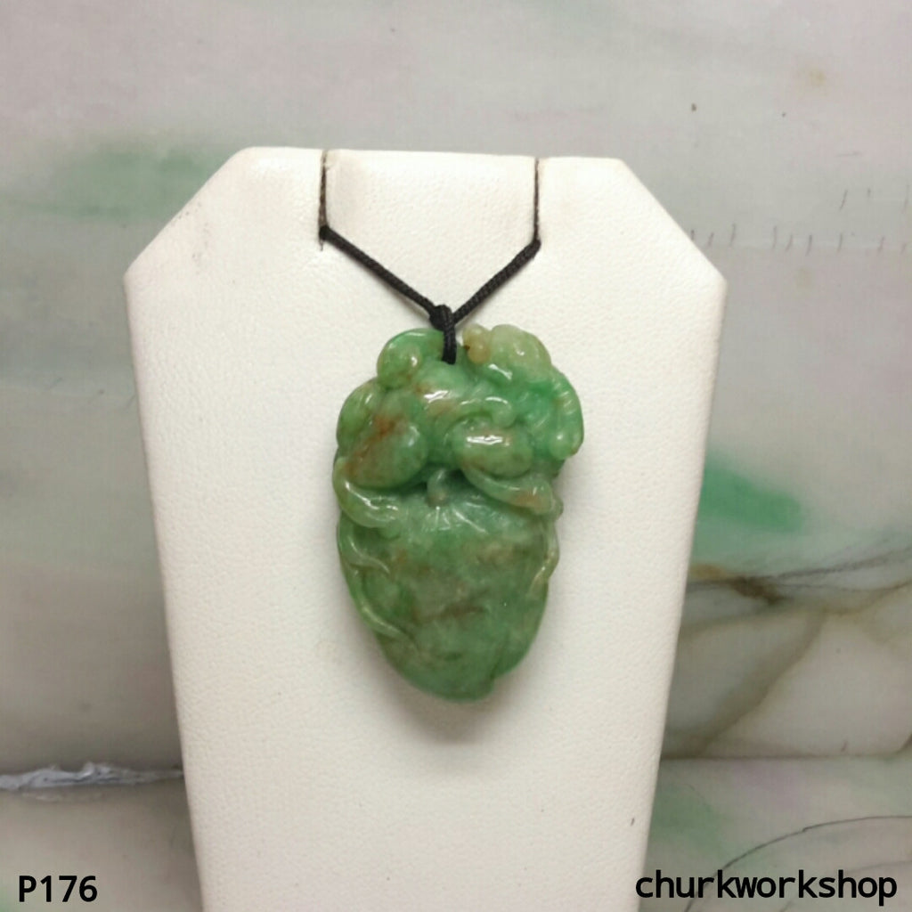 Carved jade pendant.