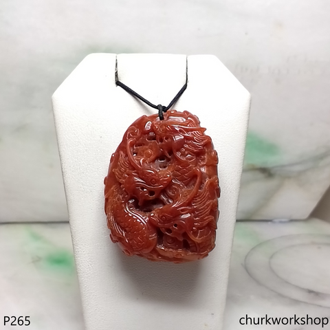 Red jade dragon pendant