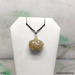 Light brown jade pig pendant with silver bail