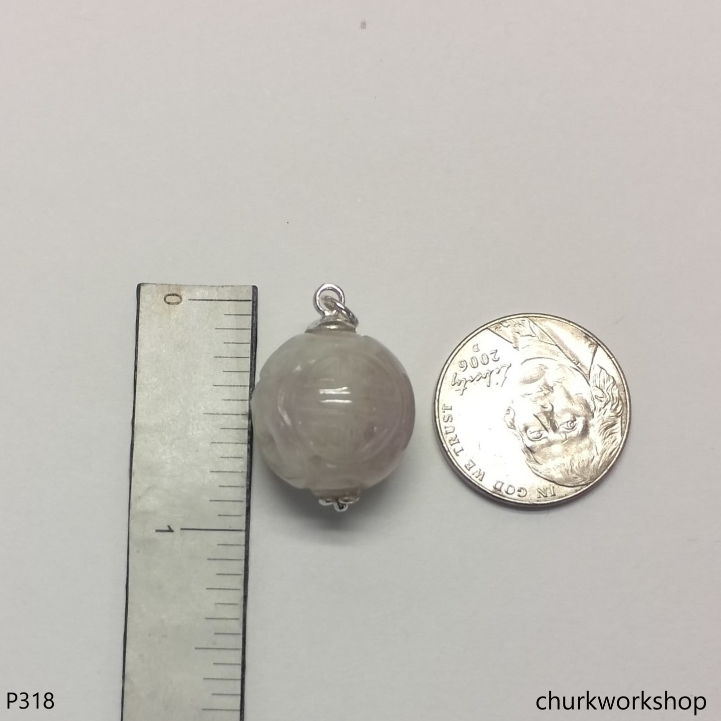 Lavender carved jade bead pendant