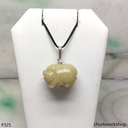 Yellow jade pig pendant with silver bail