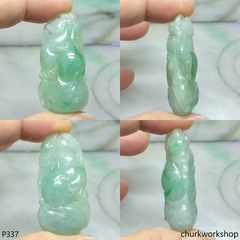 Light green carved jade pendant.