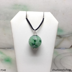 Light green carved jade bead pendant