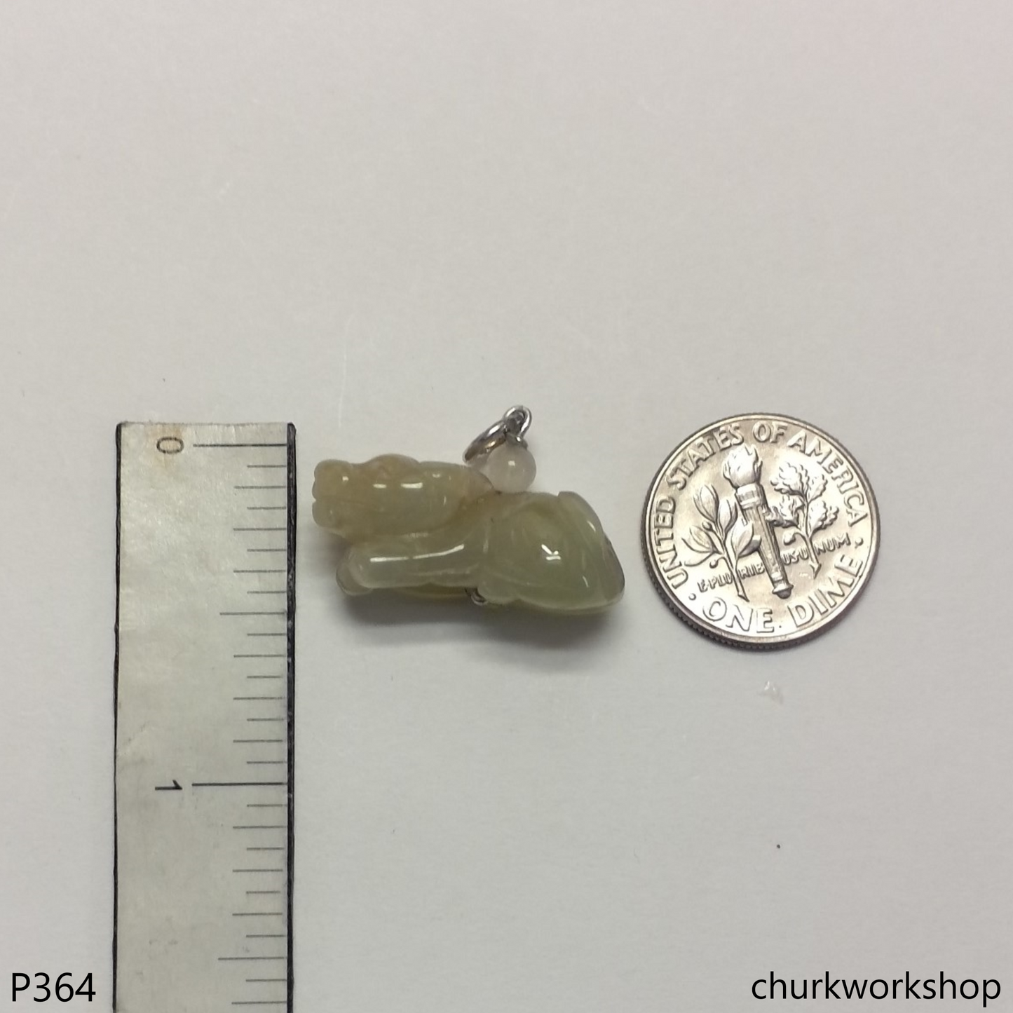 Light yellow jade ox pendant