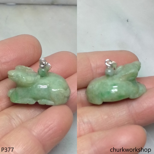 Green jade Ox pendant with silver bail