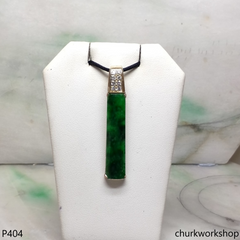 Deep green rectangular jade pendant in 14k gold
