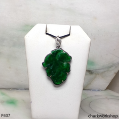 Deep green jade leaf pendant in 14k white gold