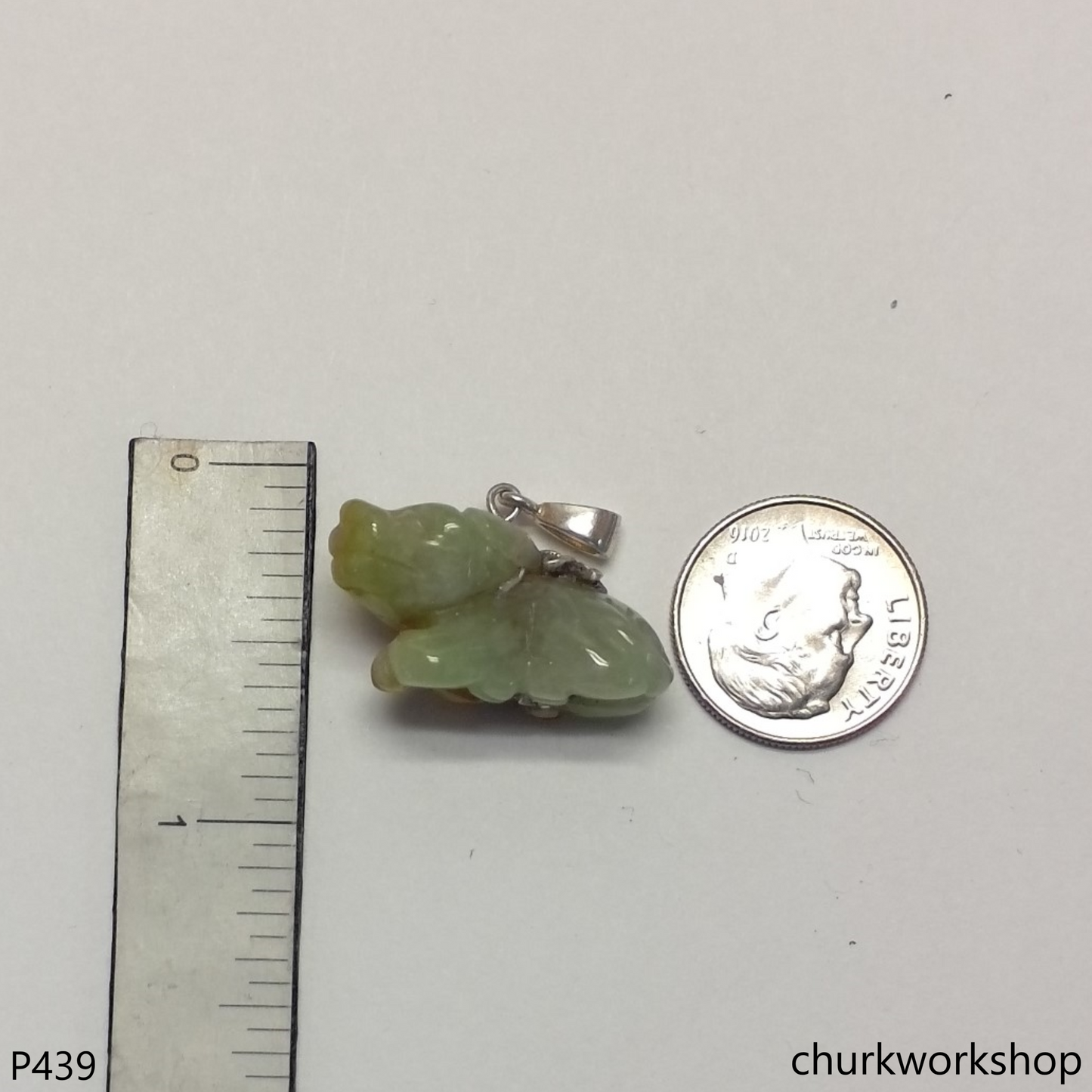 Light yellow jade ox pendant