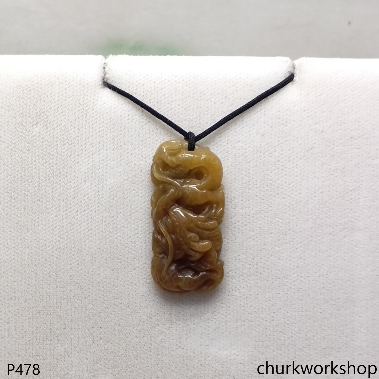 Red jade dragon pendant
