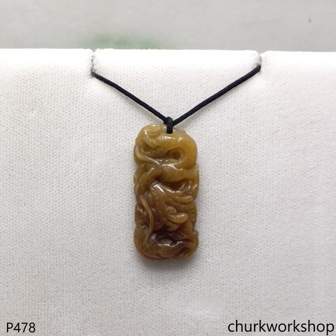 Red jade dragon pendant