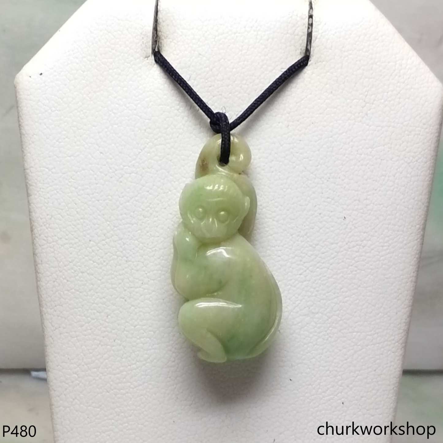 Light green jade monkey pendant