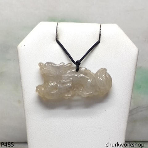 Pale brownish jade dragon pendant