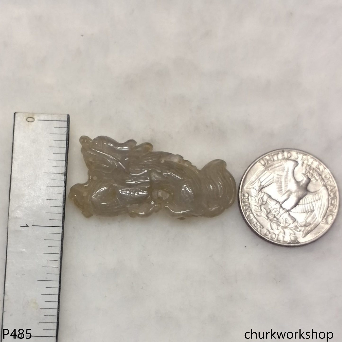 Pale brownish jade dragon pendant