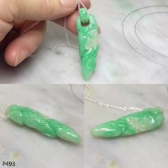 Green jade pendant with jade bail connected