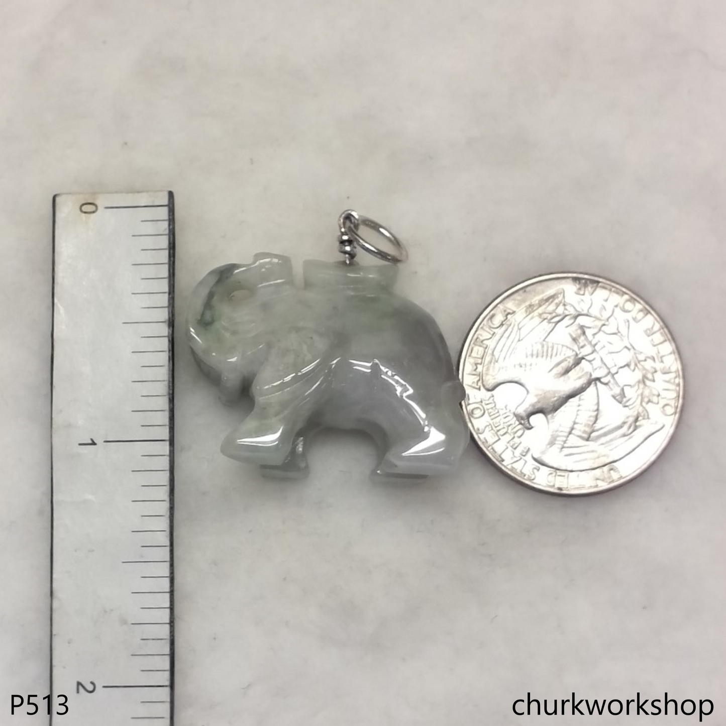 Jade elephant pendant with silver bail