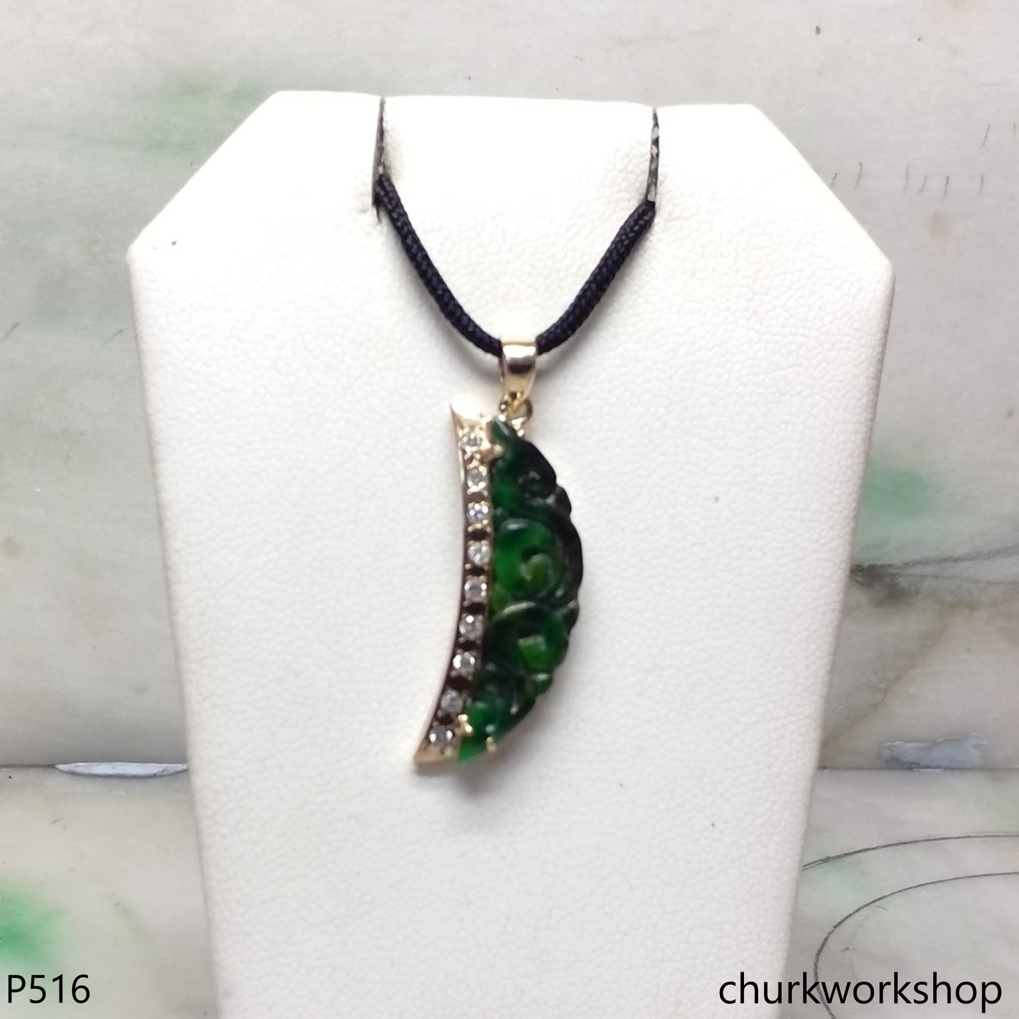Deep green jade carved pendant in 14k yellow gold