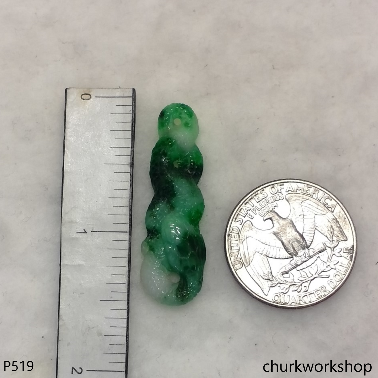 Green jade snake pendant.
