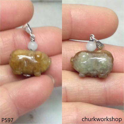Red jade pig pendant with silver bail