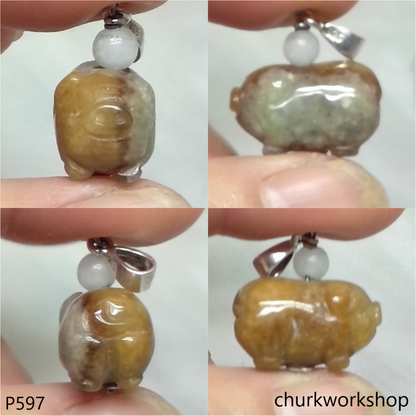 Red jade pig pendant with silver bail
