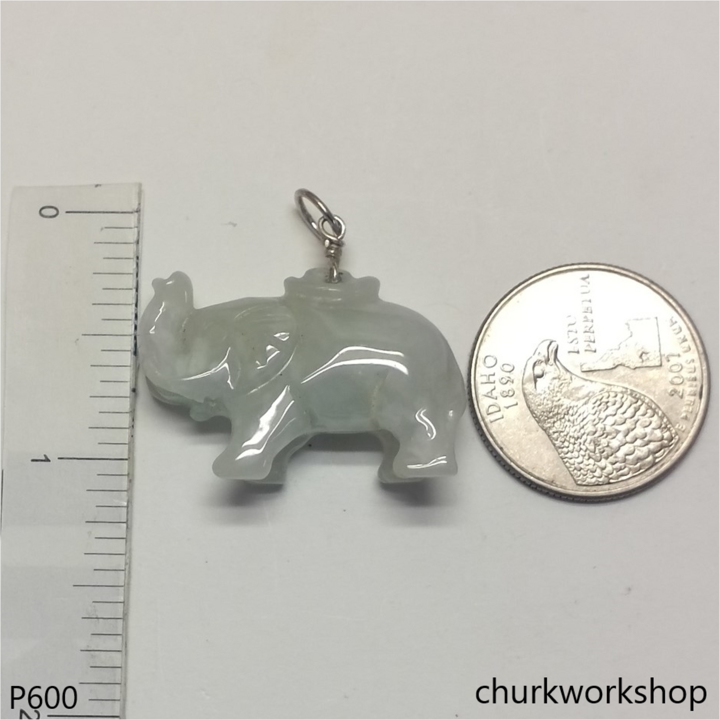Jade elephant pendant with silver bail