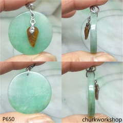 Light green round jade with dangling red leaf pendant