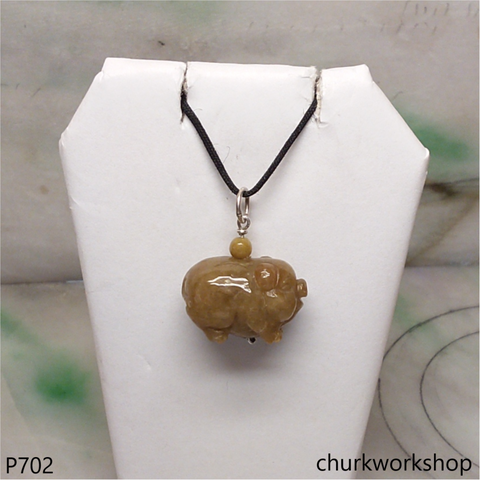 Red jade pig pendant with silver bail
