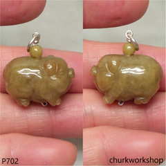 Red jade pig pendant with silver bail
