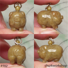 Red jade pig pendant with silver bail