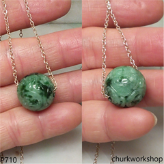 Carved green jade bead pendant