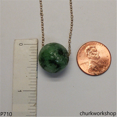 Carved green jade bead pendant