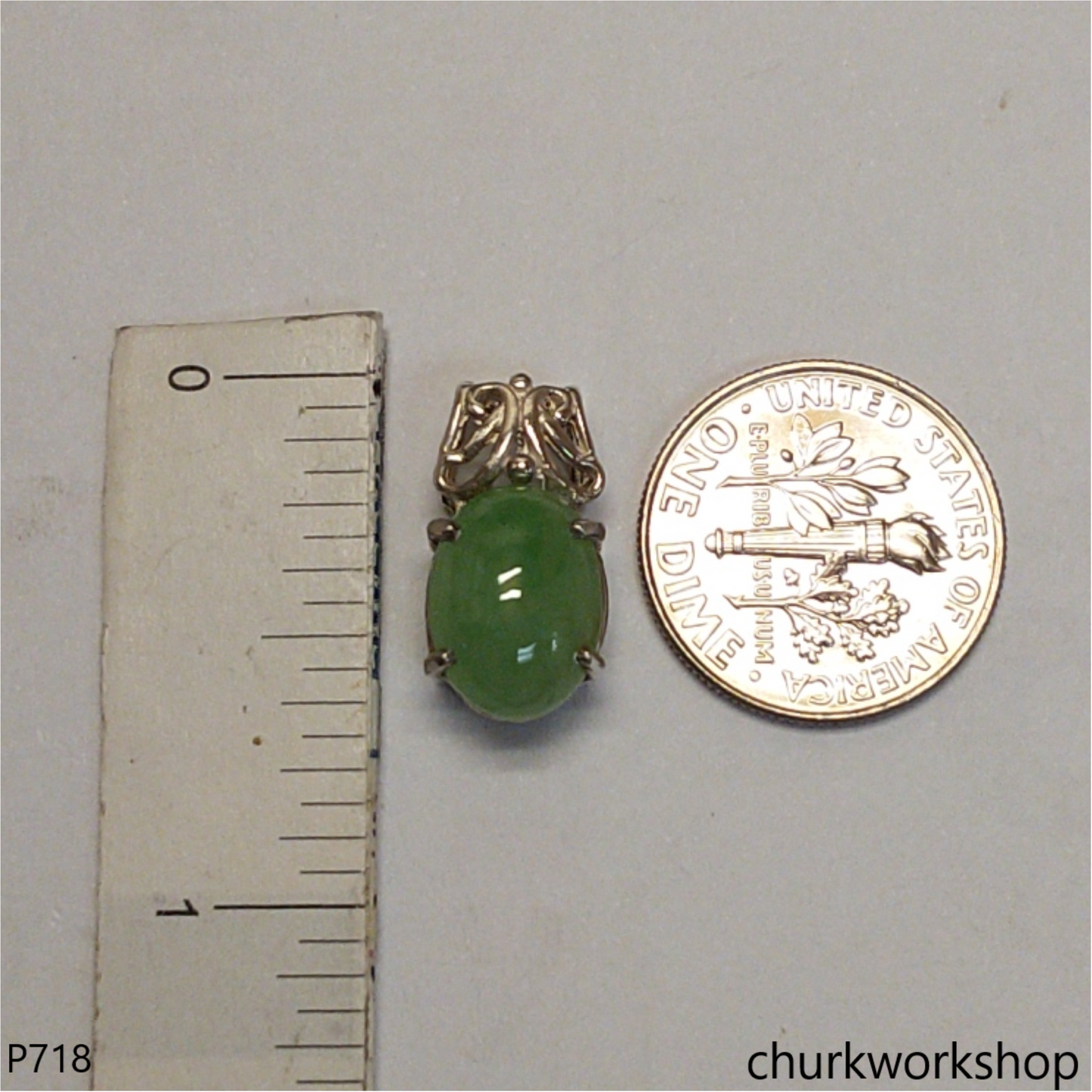Small jade sterling silver pendant