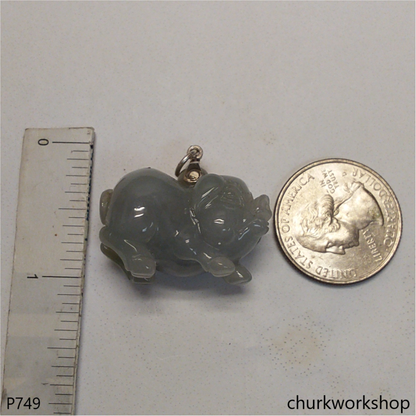 Grayish lavender jade pig with silver bail.