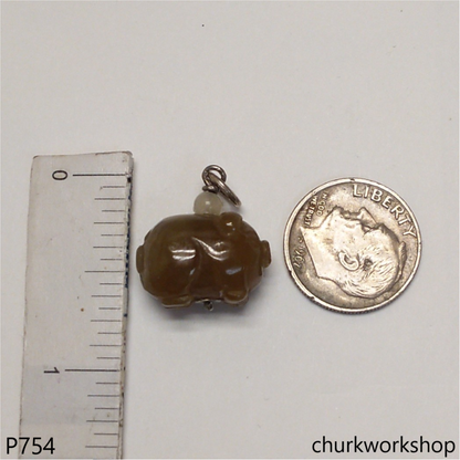 Red jade pig pendant with silver bail