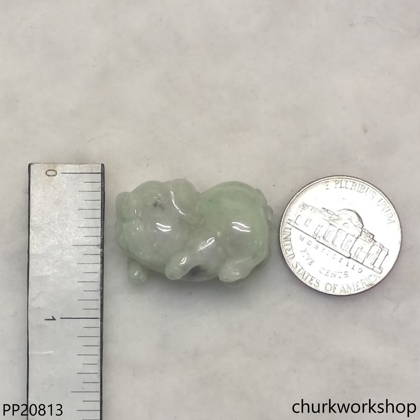 Pale green jade pig pendant