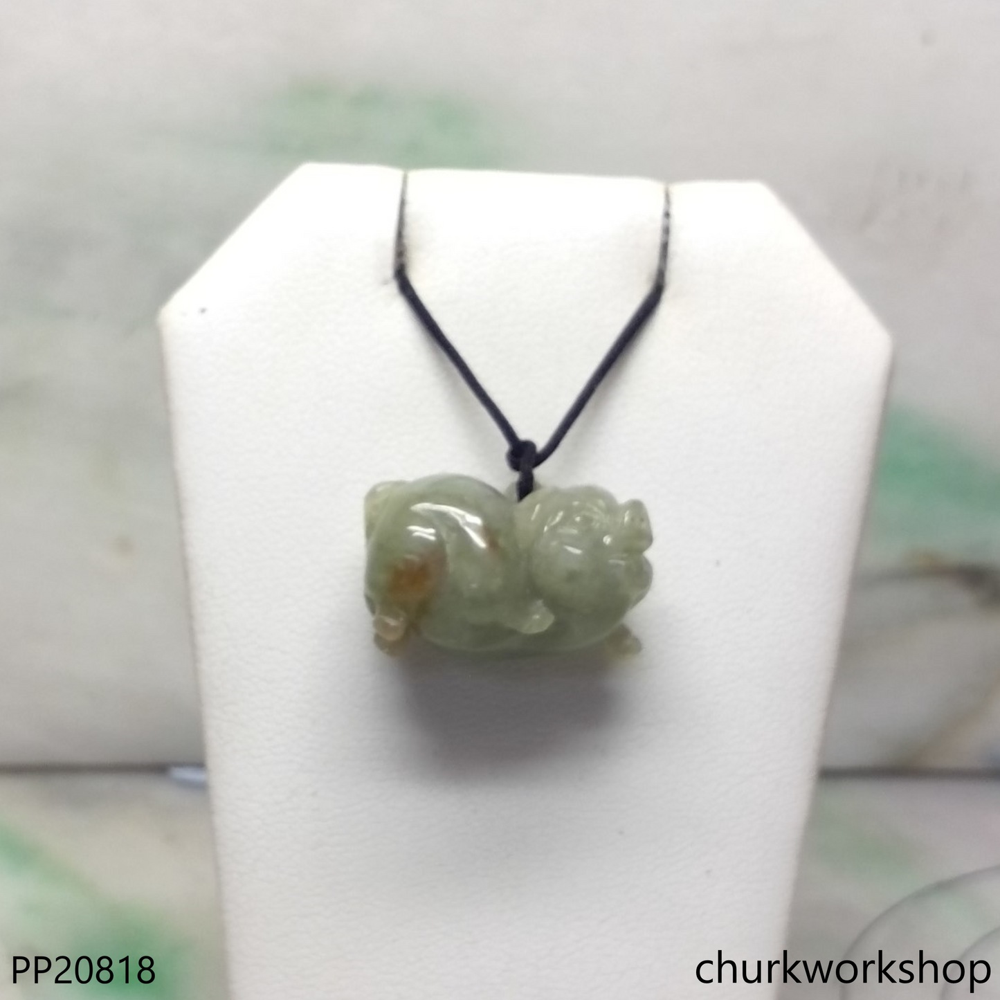 Bluish green jade pig pendant