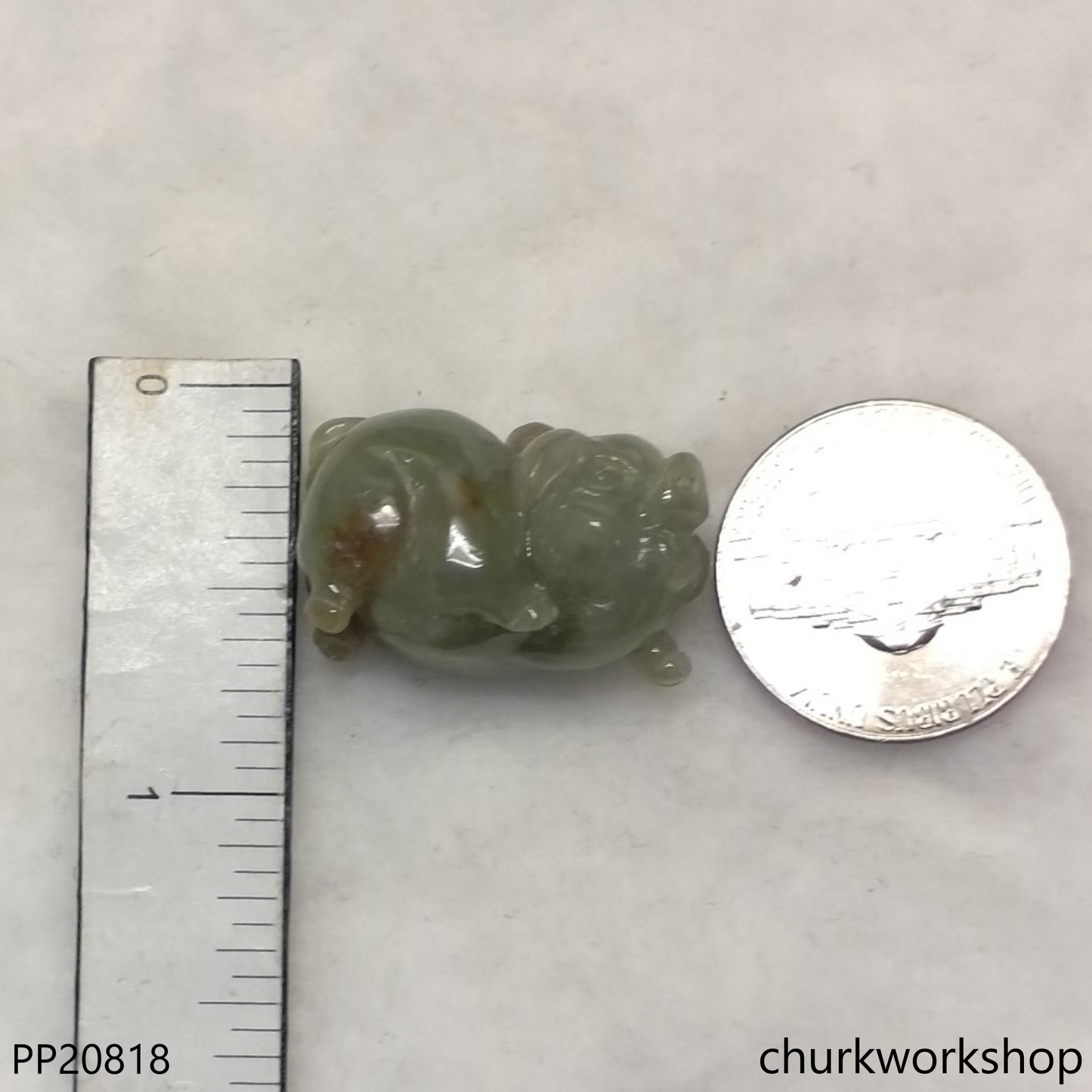 Bluish green jade pig pendant