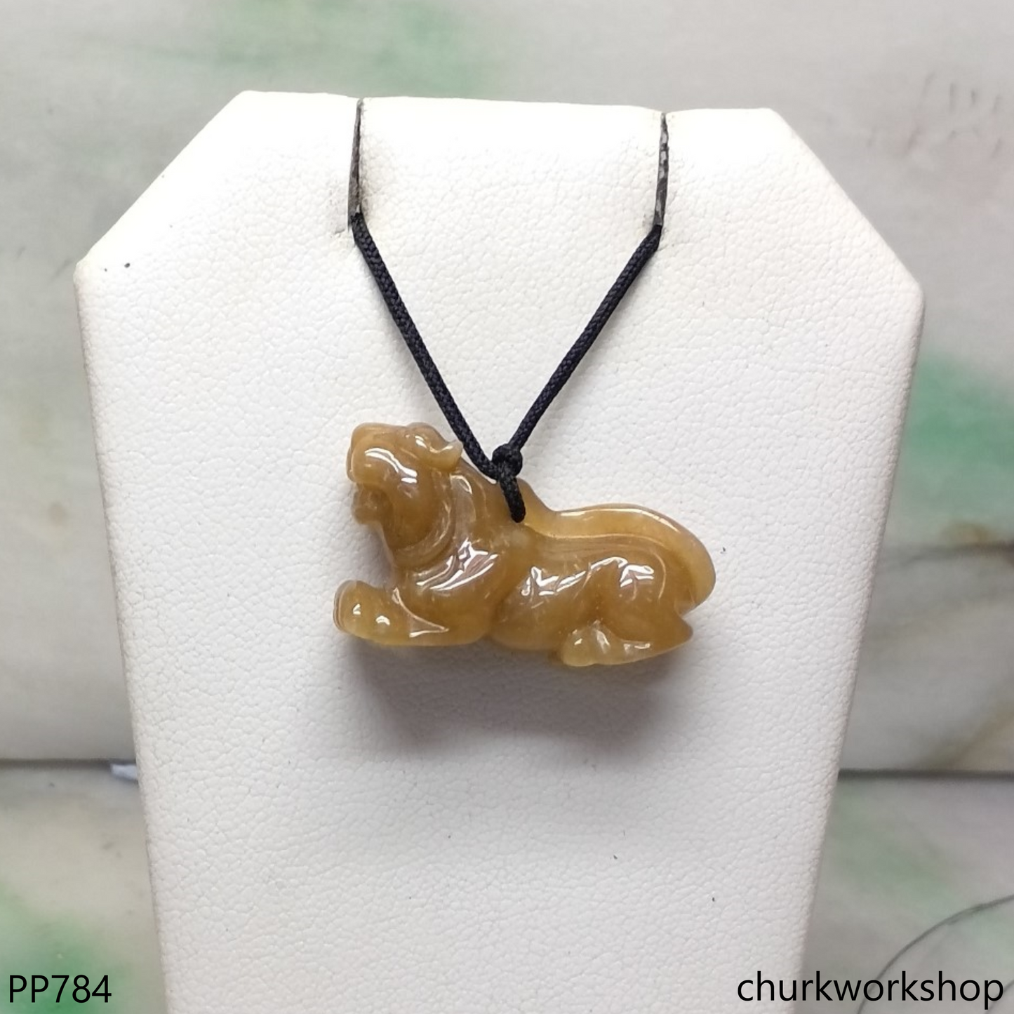 Red jade tiger pendant