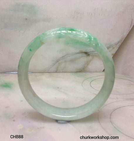Craved light green jade bangle