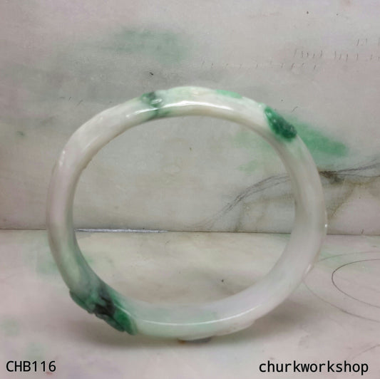 Carved green jade bangle