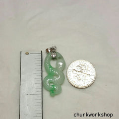 Natural color jade snake pendant.