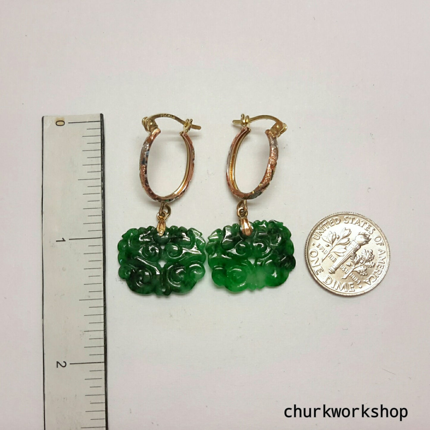 Green carved jade earrings