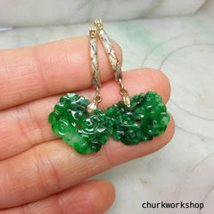 Green carved jade earrings
