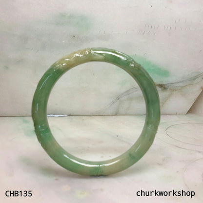 Small carved green jade bangle